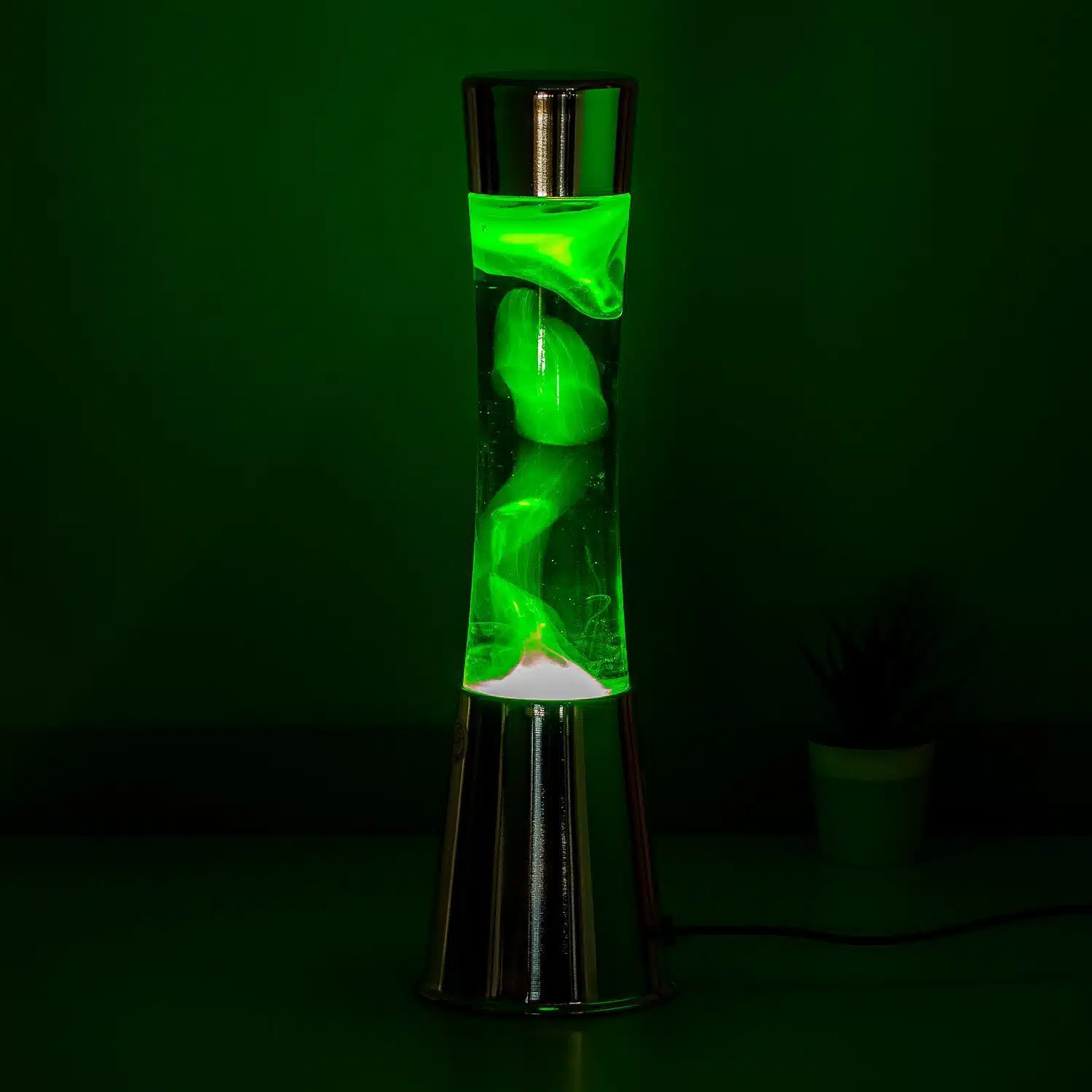 Lavalamp zilver met groene vloeistof en gele lava