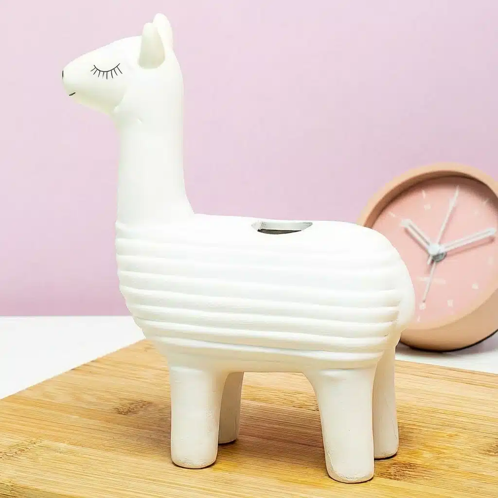 Lama bloempot met zaadjes