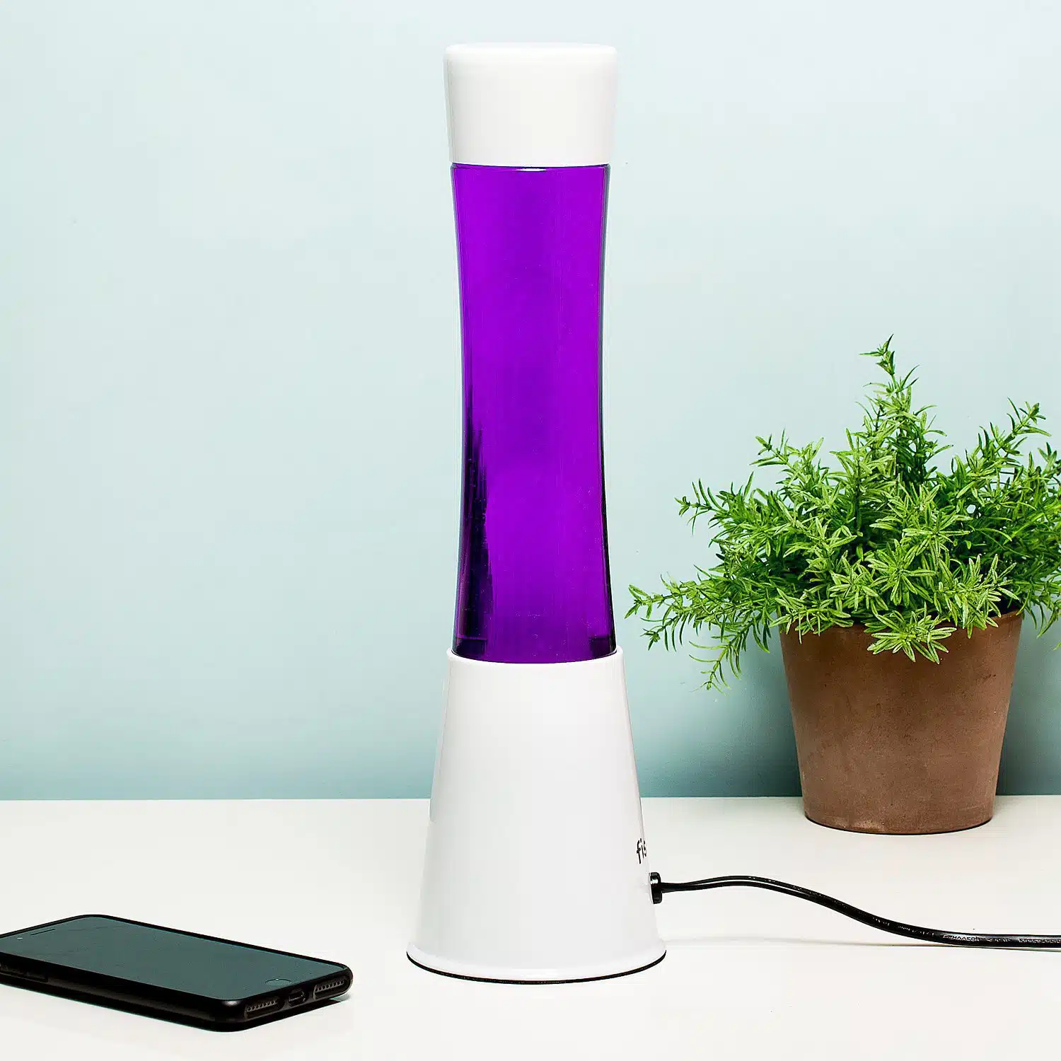 Lavalamp wit met paarse vloeistof en witte lava