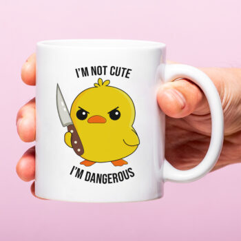 Mok met Tekst ‘’I'm not cute I'm dangerous’’ | Materiaal: Keramiek | 33 cl | Mok met Tekst | Koffie Mok | Grappige Cadeau | Vaatwasser bestendig | Humor | Mok met grappige tekst
