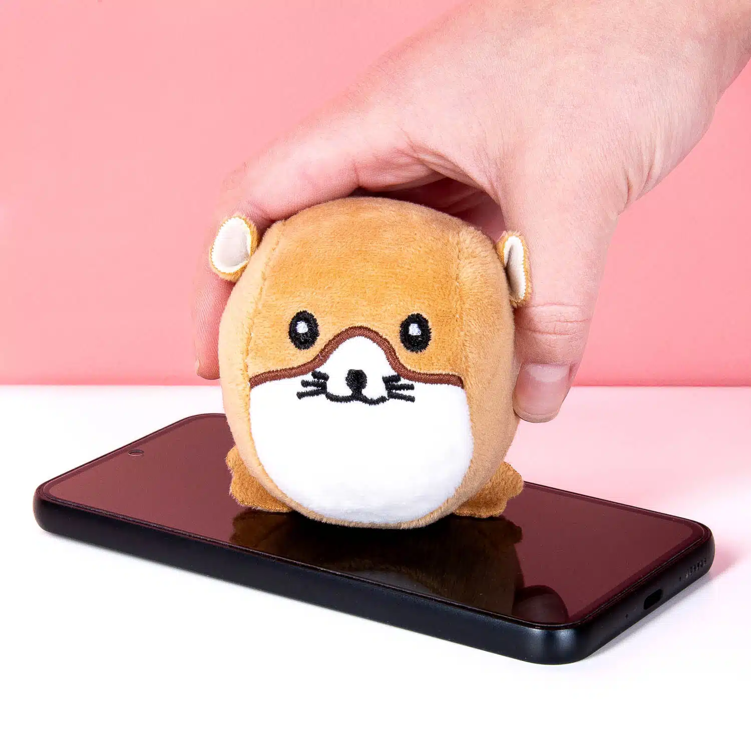 Hamster stressbal en schermreiniger