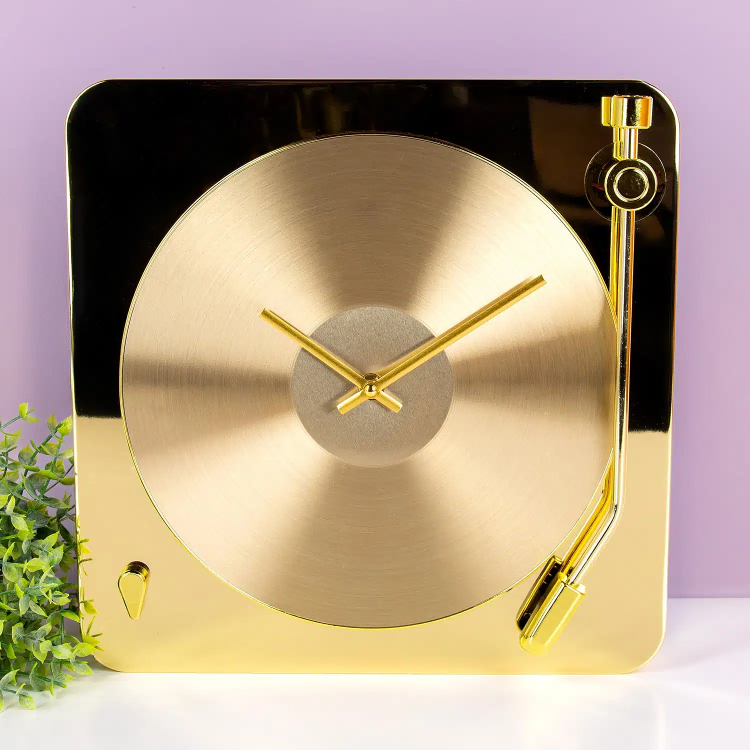 Goudkleurige platenspeler klok